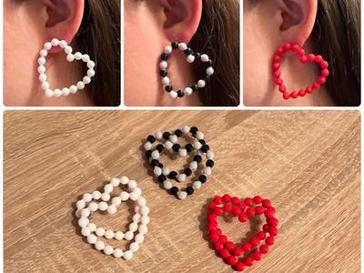 TOUS heart earrings