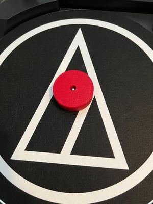 Phone adapter stand for record player spindle