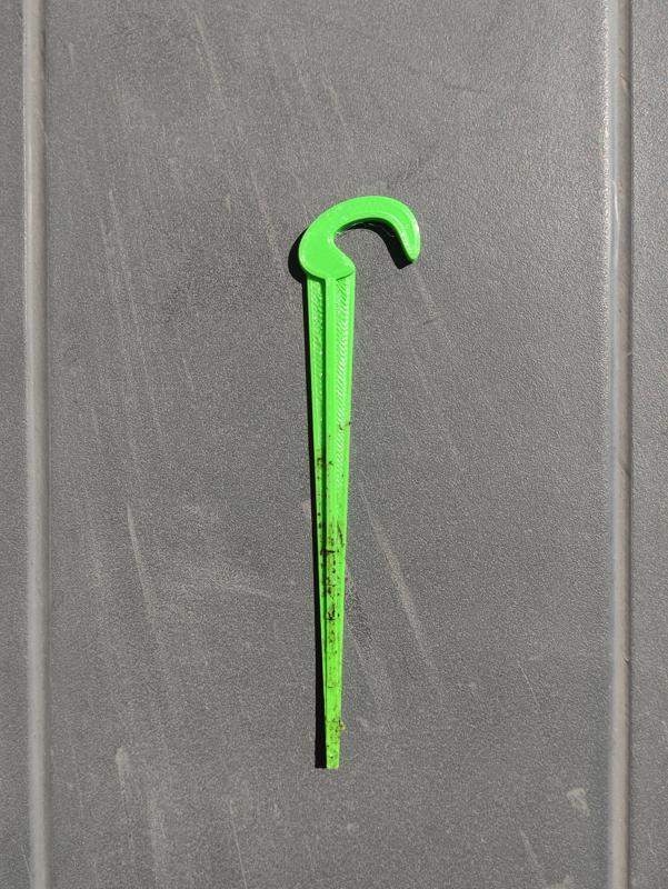 Garden irrigation pipe holder