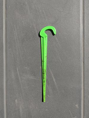 Garden irrigation pipe holder