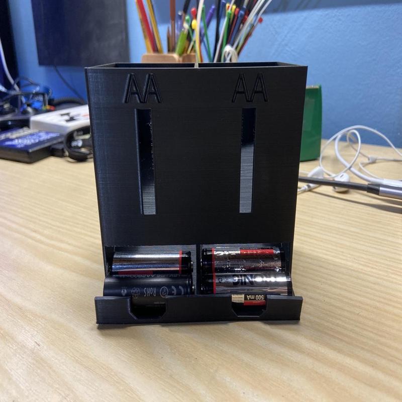 Battery dispenser dual AA