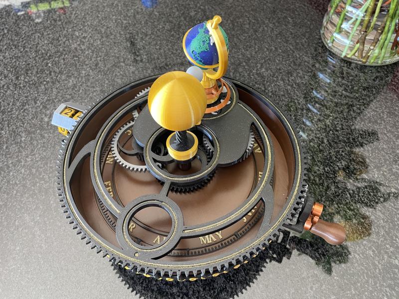 Orrery with editable month text and color-coded earth and other parts