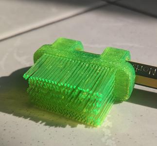 Brush head print in place hairy / stringy