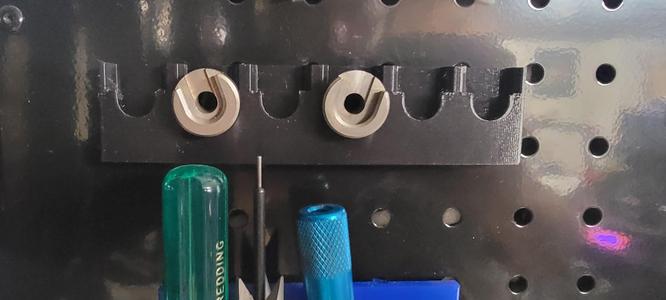 Shell holder for peg board