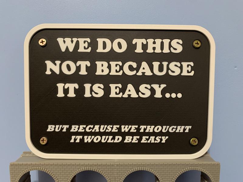 "We do this..." sign with added Screw Mounting