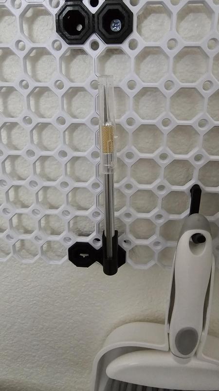 Multiboard xacto knife holder