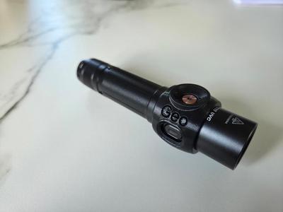 Button guard for Fenix LD32 UVC