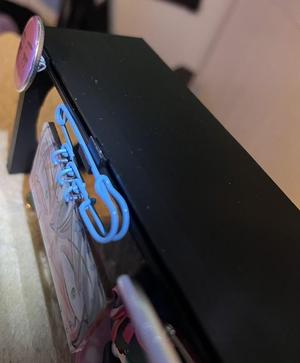 Small display stand with sliding & removable hooks
