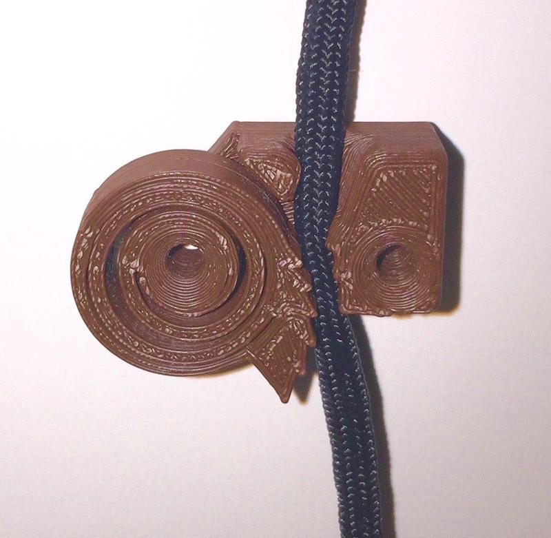 Cord tensioner and anchor