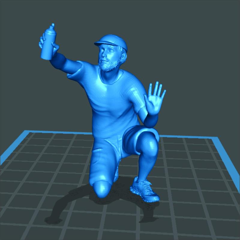 Crouched Graffiti Writer