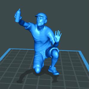 Crouched Graffiti Writer