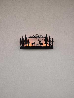 illuminated deer forest