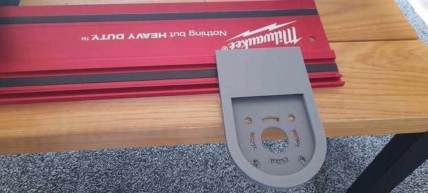 DeWalt router to the Milwaukee guide rail