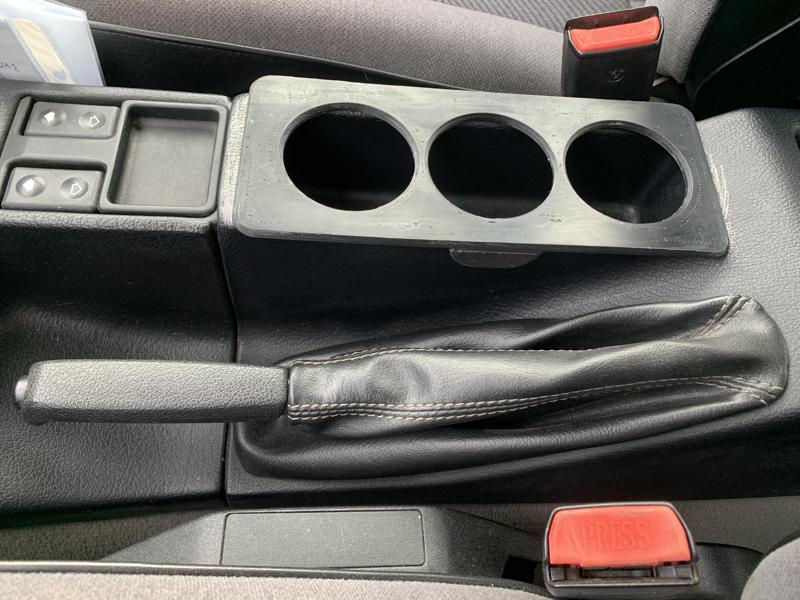 Cup holder with three holes (62.5mm diameter) Compatible with BMW E34