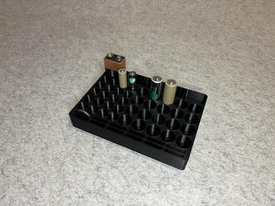 Battery stand for AA, AAA, 9V and CR2032 batteries