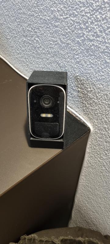 Security camera housing holder