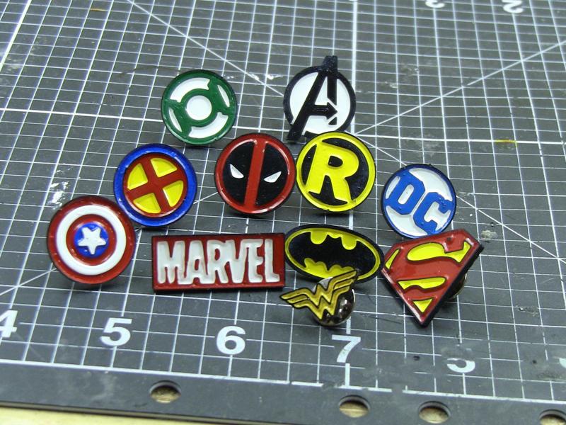 Comic logos enamel pins