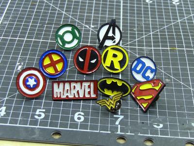 Comic logos enamel pins