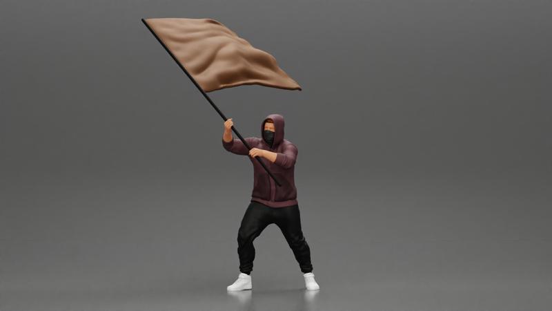 Man in hoodie and mask holding a big flag in support