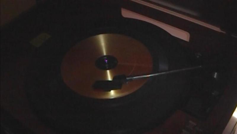 Playable Record with 45RPM adapter