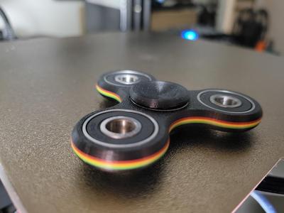tri fidget spinner indented finger pads