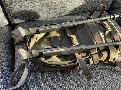 Hiking pole holder for MOLLE system