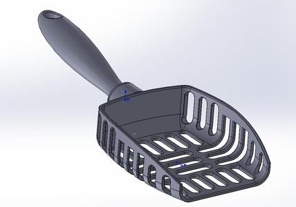 A spatula for a cat tray