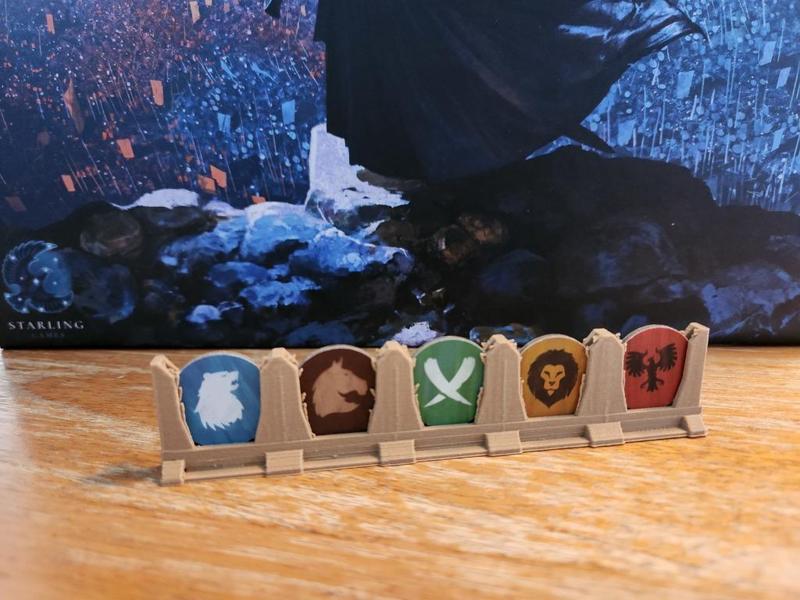 A War of Whispers loyalty token holder