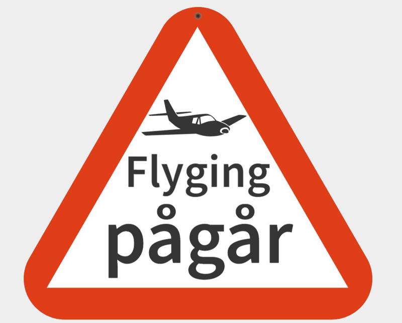 Flight in progress sign