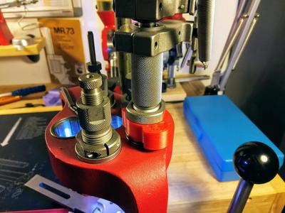 Powder measure spacer.