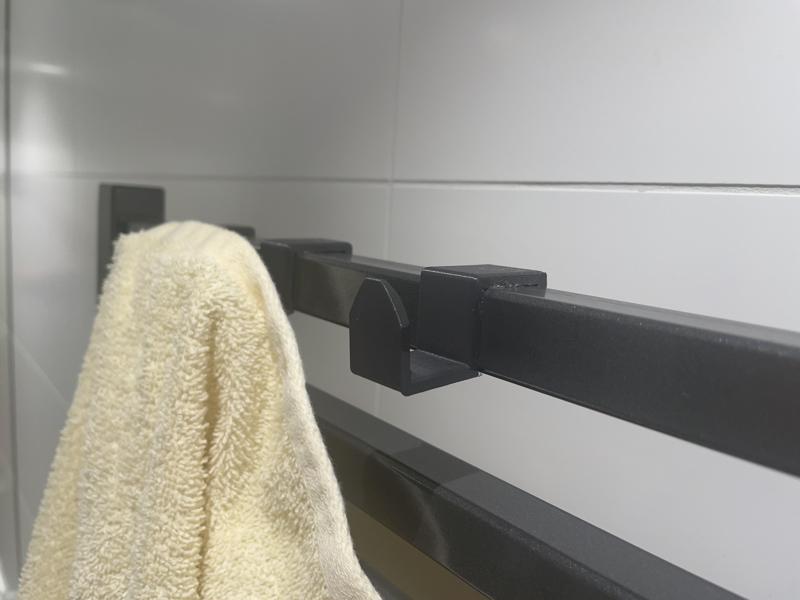 Towel holder for bathroom radiator