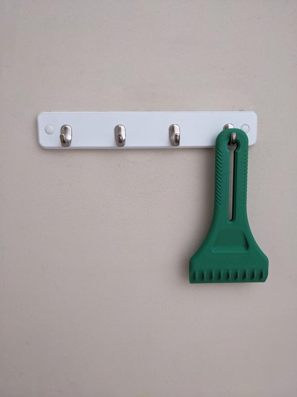 Ultimate Ice Scraper With A Bigger Hole In It