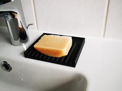 Soap dish with drain
