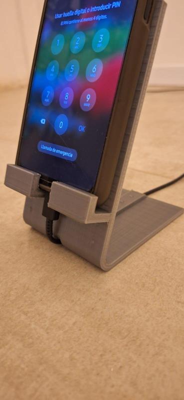 Cellular holder with charging slot