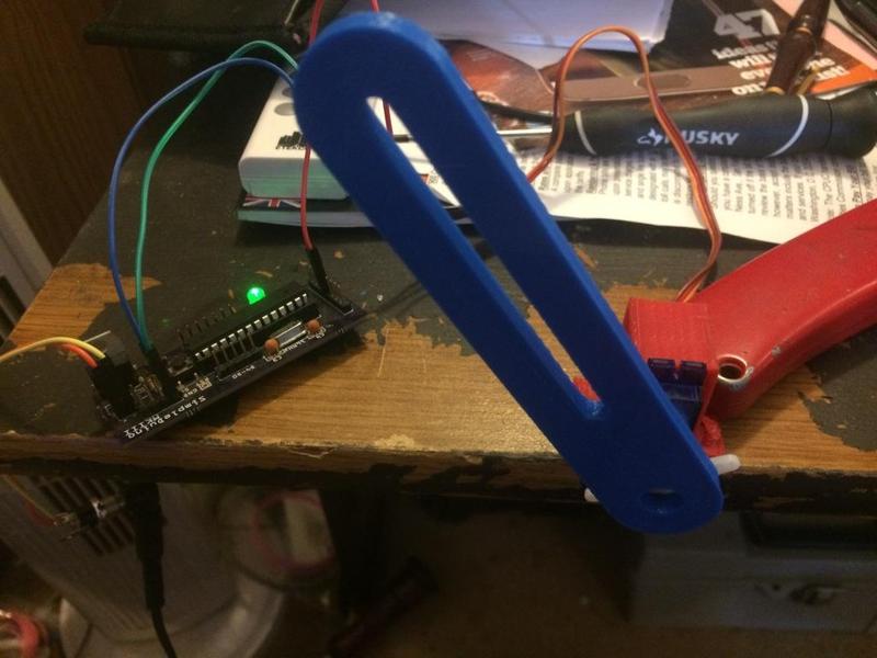 Arduino filastruder filiment guide with servo mount
