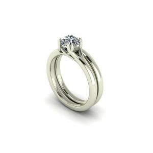 Solitaire Twist Prong Engagement Ring