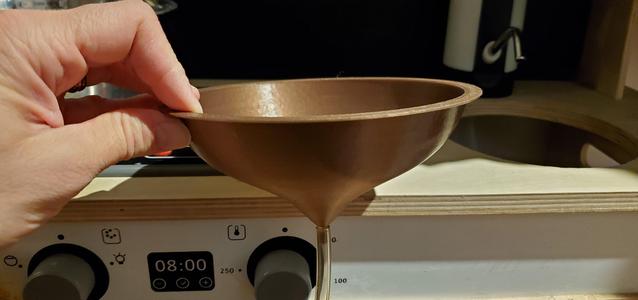 Funnel with barb