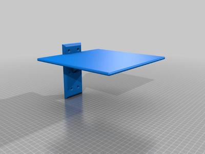 Wall mounted mouse pad