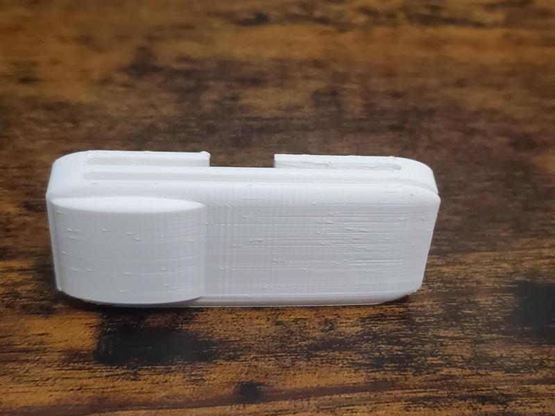 Seatbelt adjustment clip