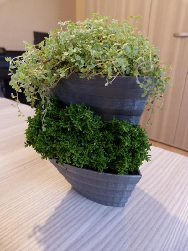 Small stackable planter for creating vertical garden