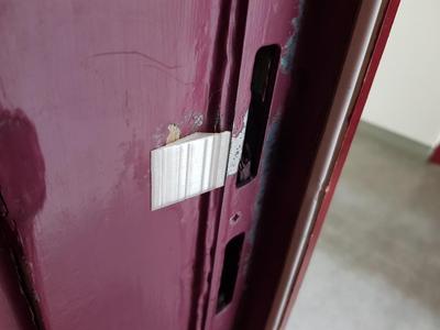 Door latch slide