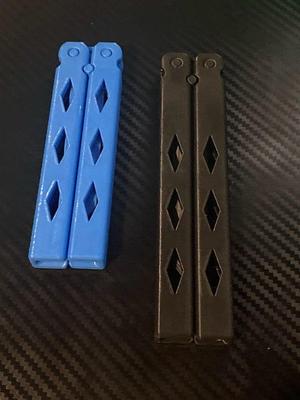 Longer print in place butterfly knife