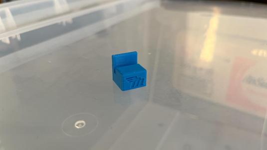 Tiny Stand with embossed logo of Mototechna CZ