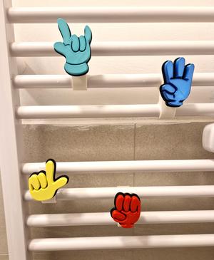 Hooks for bathroom radiators