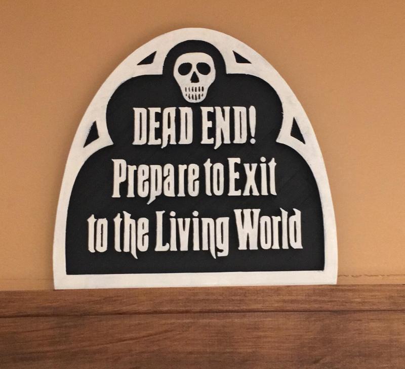 The Haunted Mansion Ride Exit Sign