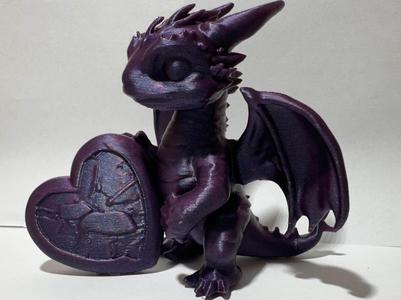 Dragon holding heart