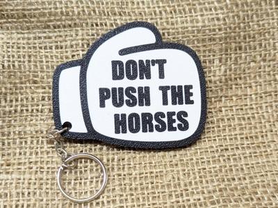 "Don't push the horses" boxing gloves keychain
