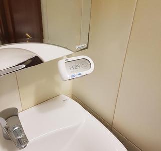 Bracket for holding Oral B SmartGuide under a mirror