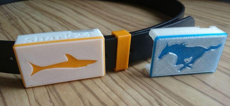 rugged airport buckle with 2-color logo on a single color printer