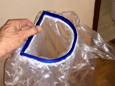 One handed trash bag holder